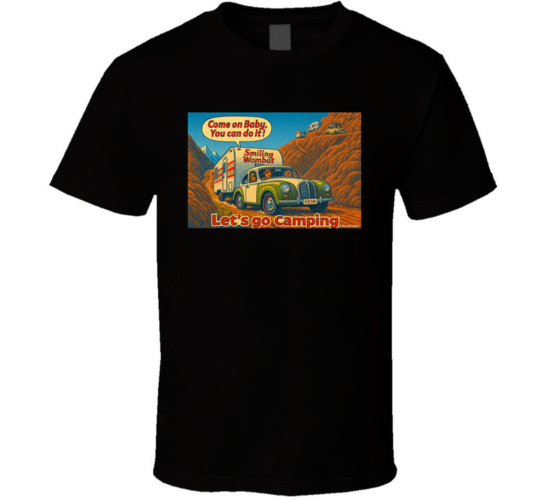 - “Smiling Wombat RV T-shirt featuring vintage-style car towing trailer up mountain with ‘Come on Baby’ slogan”