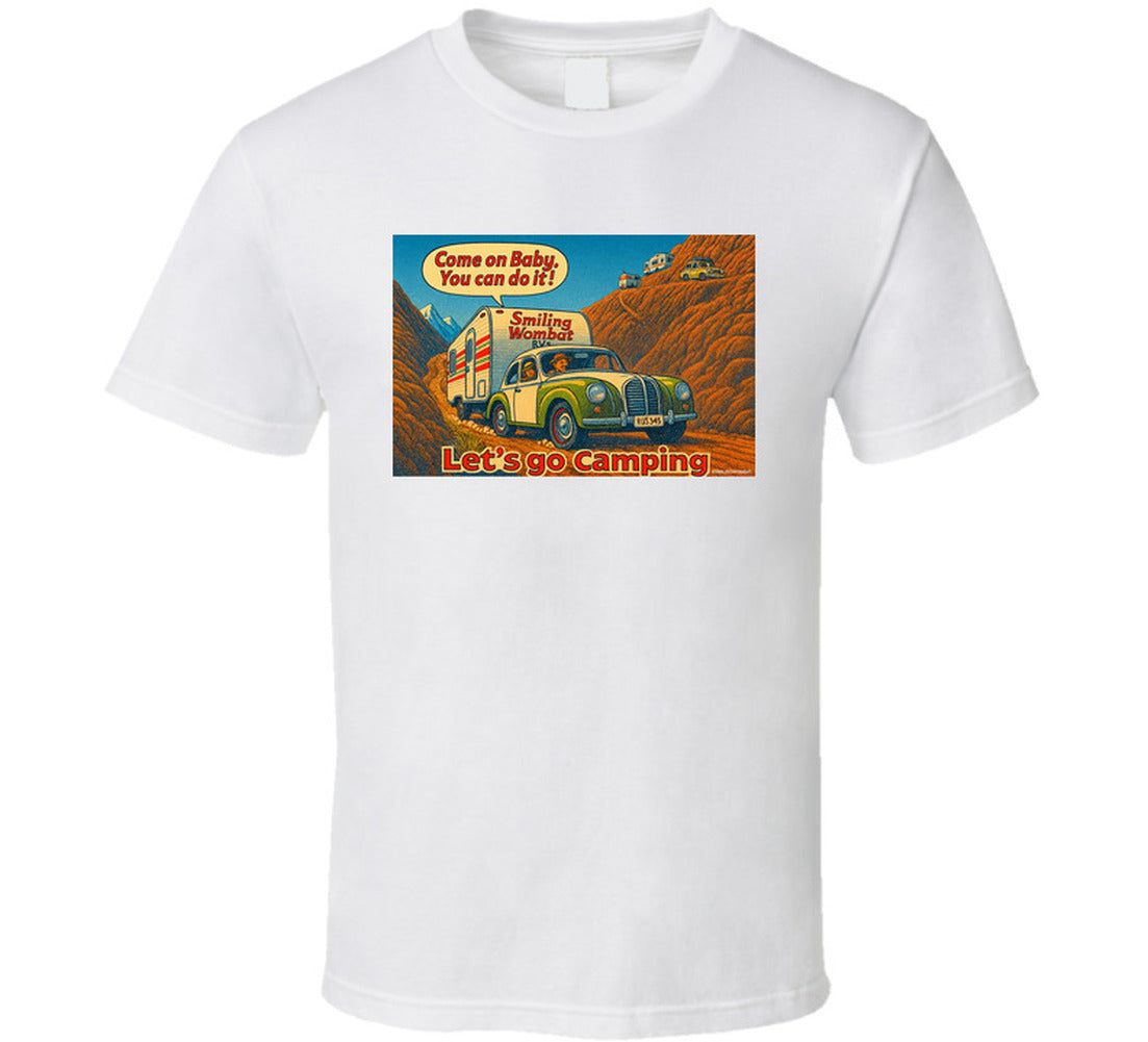- “Smiling Wombat RV T-shirt featuring vintage-style car towing trailer up mountain with ‘Come on Baby’ slogan”