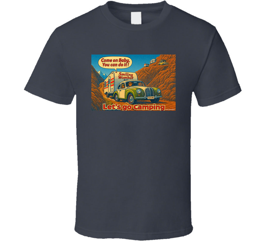 - “Smiling Wombat RV T-shirt featuring vintage-style car towing trailer up mountain with ‘Come on Baby’ slogan”