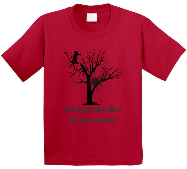 Spooky Attire - "What do humans wear" Halloween T-Shirt - Smiling Wombat