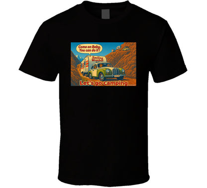 - “Smiling Wombat RV T-shirt featuring vintage-style car towing trailer up mountain with ‘Come on Baby’ slogan”
