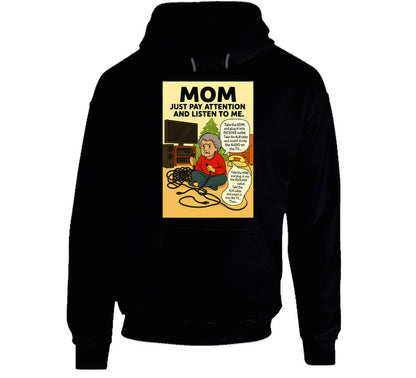 “Smiling Wombat hoodie with tangled cords, frustrated mom, and Christmas tree background”