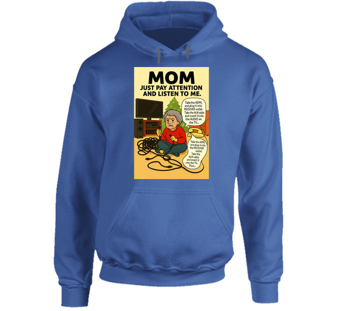 “Smiling Wombat hoodie with tangled cords, frustrated mom, and Christmas tree background”