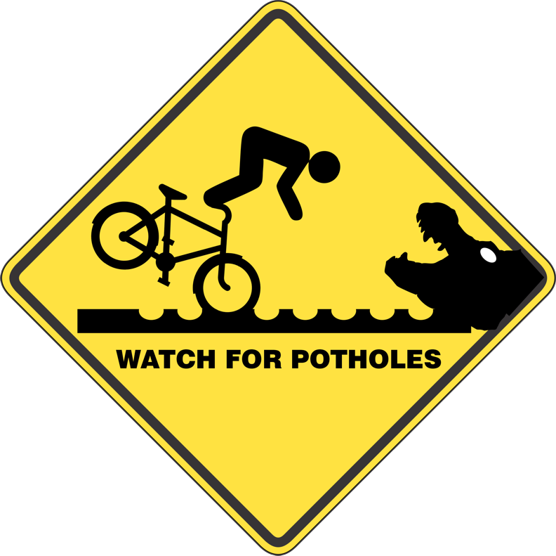 Bumpy Road Ahead - Watch Out for Potholes T-Shirt - Smiling Wombat